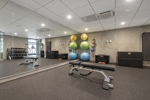 Gym with weight equipment l Rasa Apartments in Oakland CA